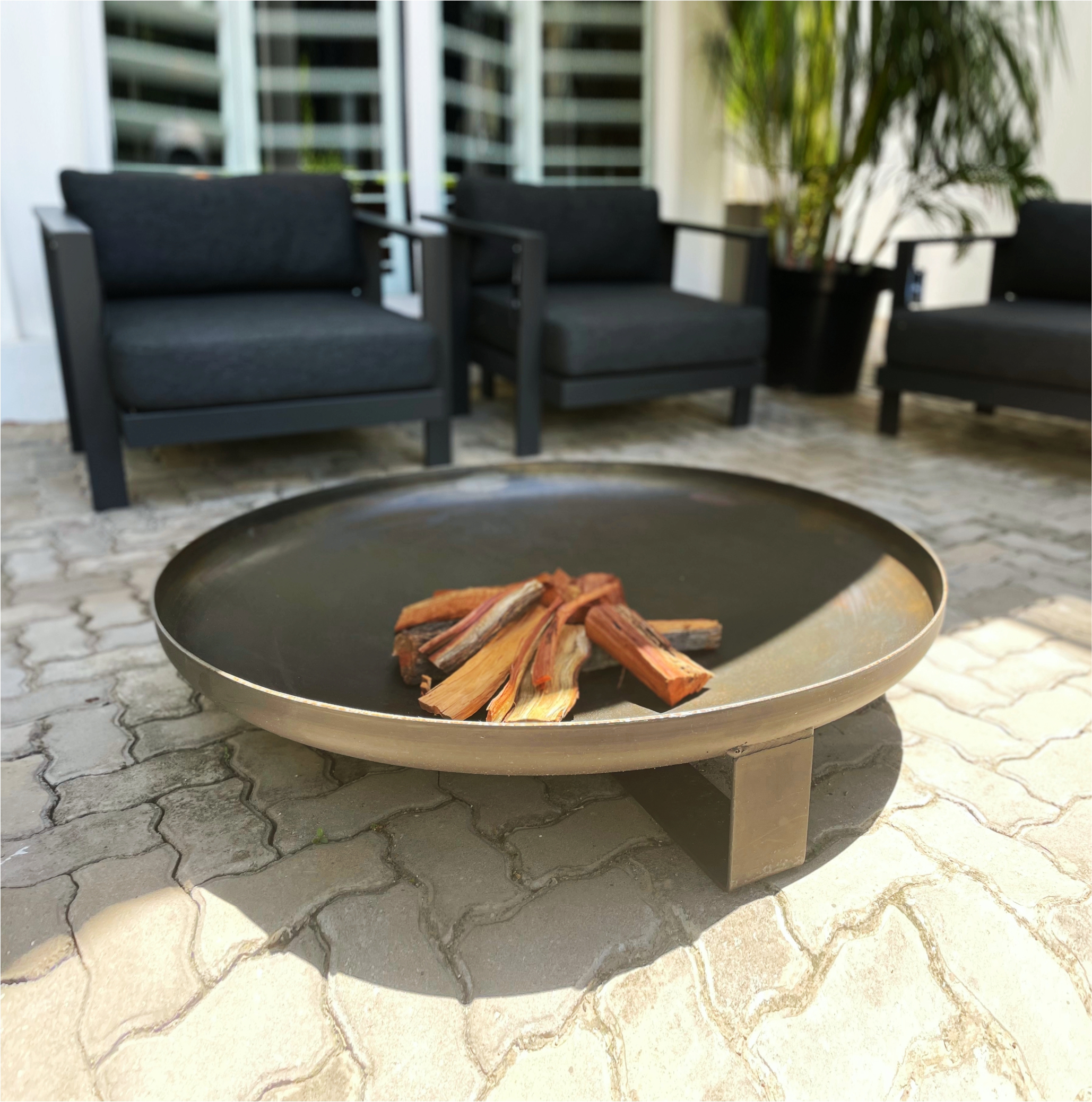 Northern Flame Hakan 920mm outdoor fire pit, wide shallow steel bowl on square legs, wood-burning patio fire pit