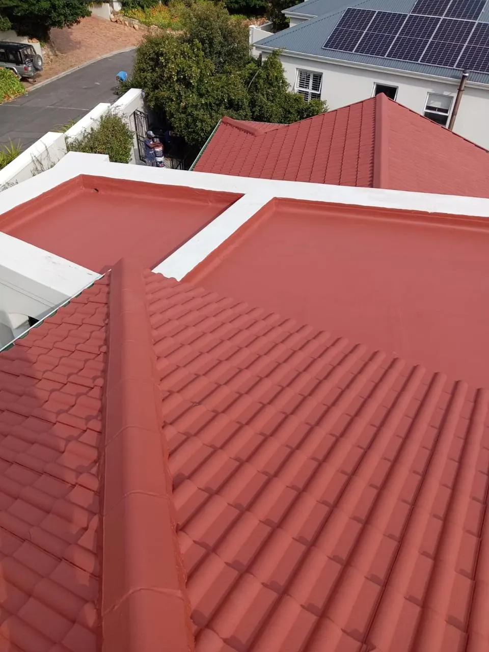 Roof tiles painted red by Fire Flames