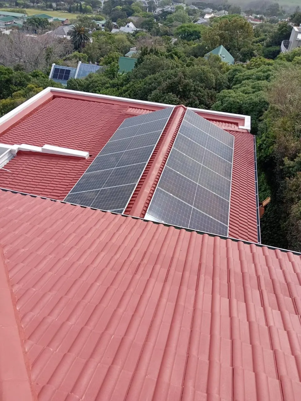 Painted roof with solar panels