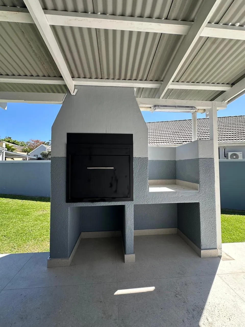 Built-in braai under a covered patio in Durbanville