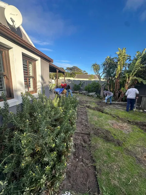 The back garden lawn before the paving and deck work started