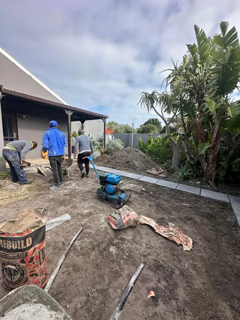Our team excavating and preparing the ground for paving