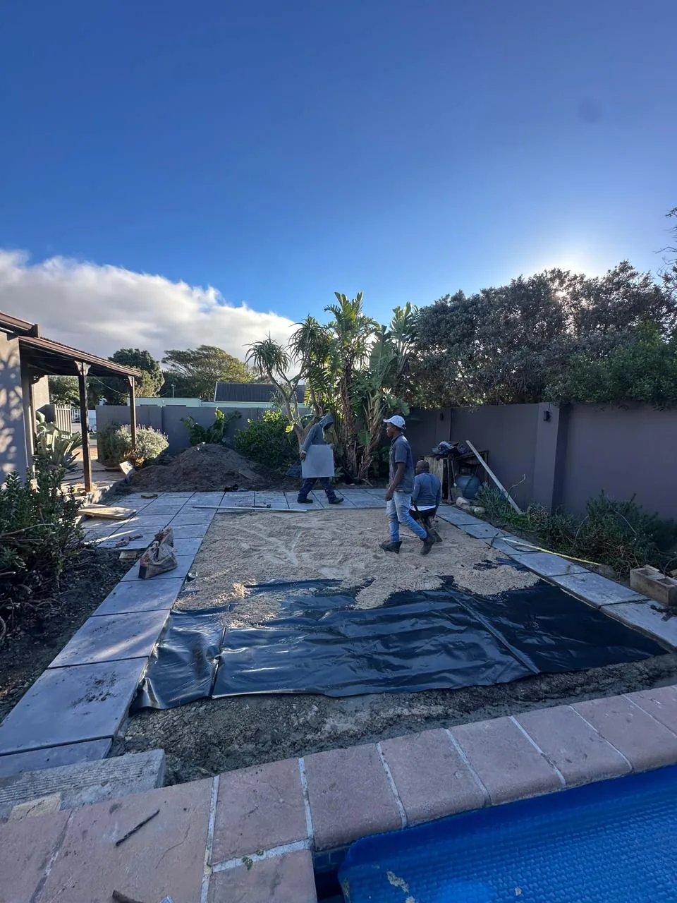 Weed membrane laid before paving the pool area
