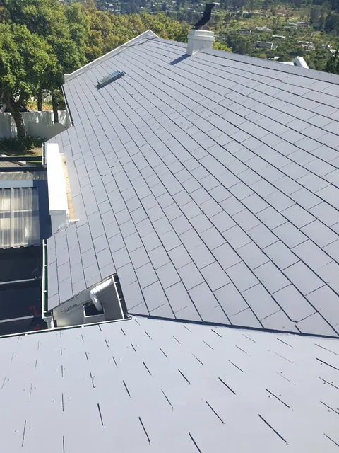 Grey painted roof sections with skylights on a Hout Bay home