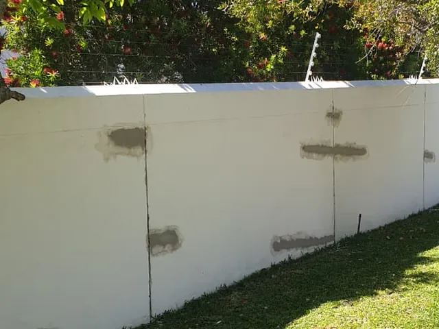 Plastered wall with crack repairs patched and ready for paint in Hout Bay